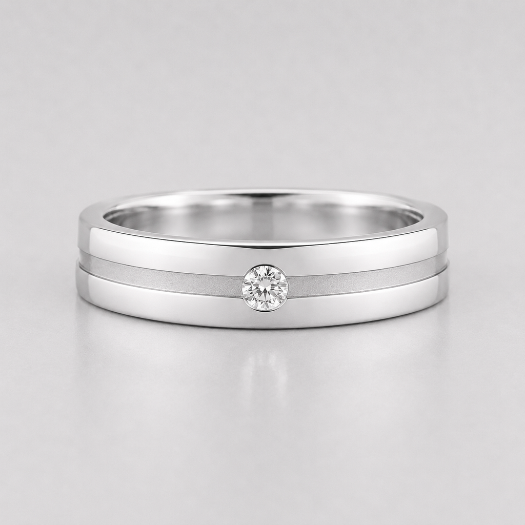 Silver ring with a diamond on a light gray background