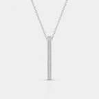 Silver necklace with a bar pendant on a light gray background