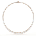 Rose gold necklace with diamonds on a white background