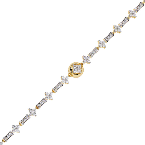 Gold and diamond bracelet on a white background