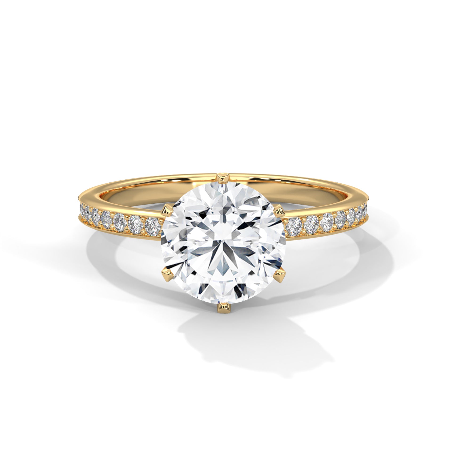 Gold ring with a large diamond and smaller diamonds on the band against a white background