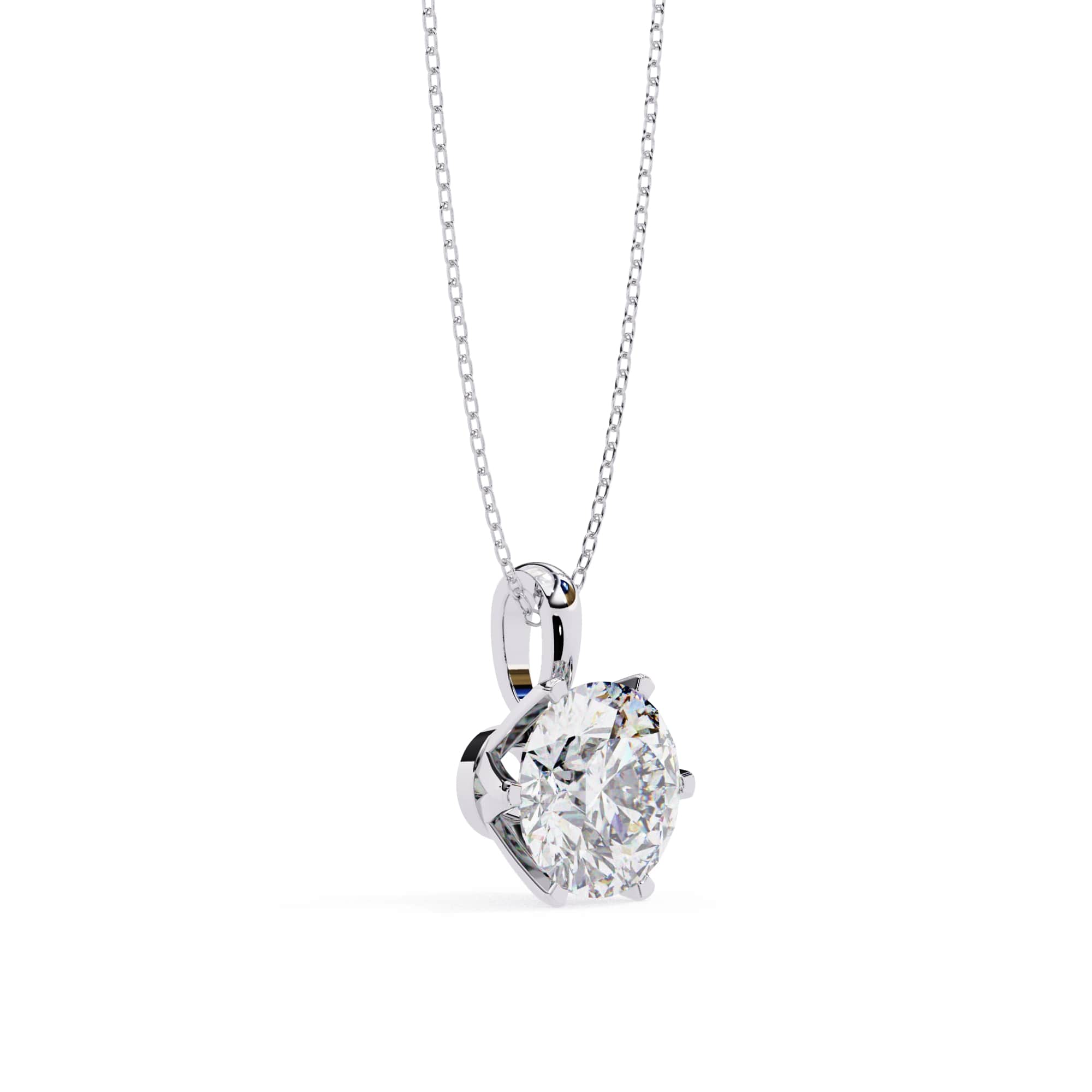 Heart-shaped diamond pendant on a white background