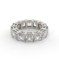 Diamond ring with a geometric design on a white background