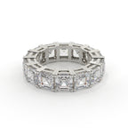 Diamond ring with a geometric design on a white background
