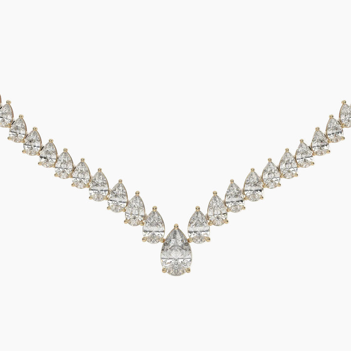 Diamond necklace with pear-shaped stones on a white background