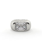 Silver ring with a large diamond on a white background