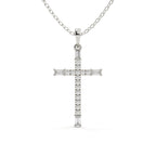 Round and baguette cut lab grown diamond Christ cross pendant in white gold with a polished finish and matching gold chain.
