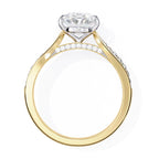 Gold ring with a diamond on a white background