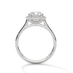 Side profile of a cushion cut diamond halo engagement ring in white gold with a pave diamond band and open gallery setting.