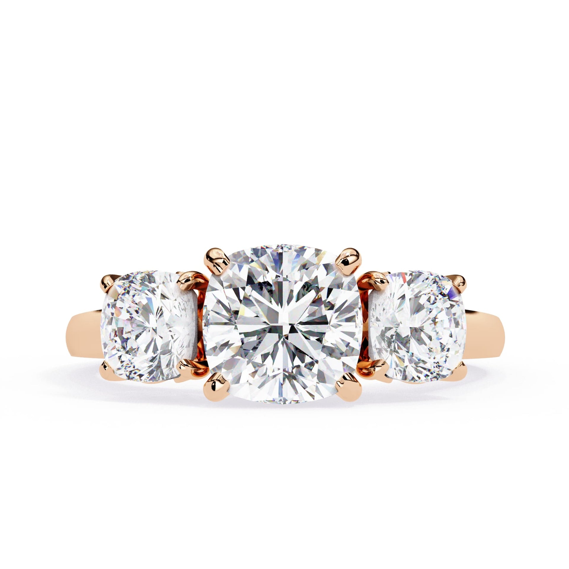 Rose gold three-stone diamond ring on a white background