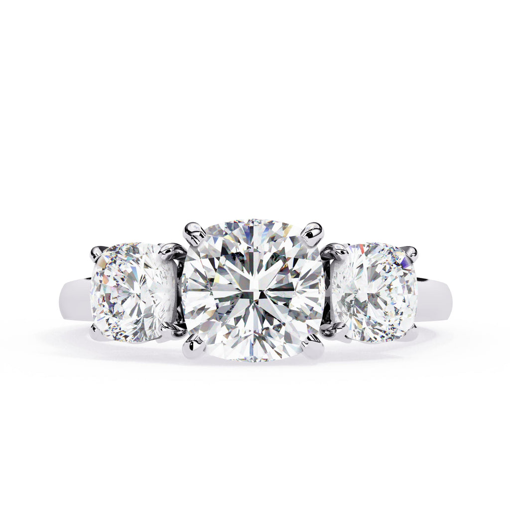 Diamond ring with three round-cut diamonds on a white background
