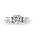 Diamond ring with three round-cut diamonds on a white background