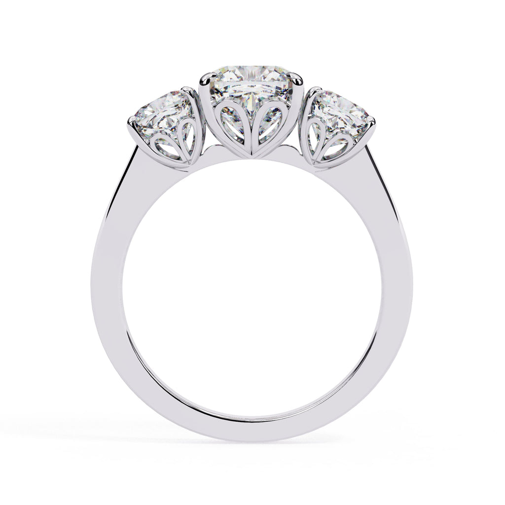Three-stone diamond ring on a white background
