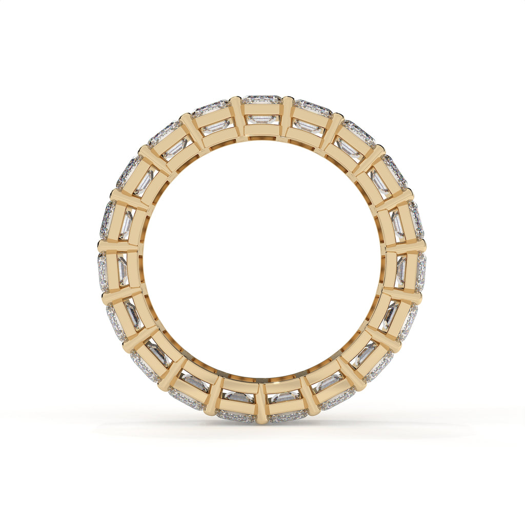 Gold ring with diamond accents on a white background