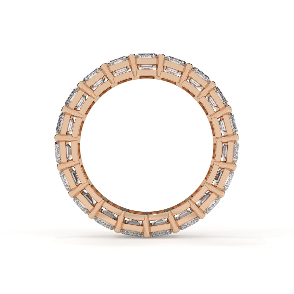 Rose gold ring with diamond accents on a white background