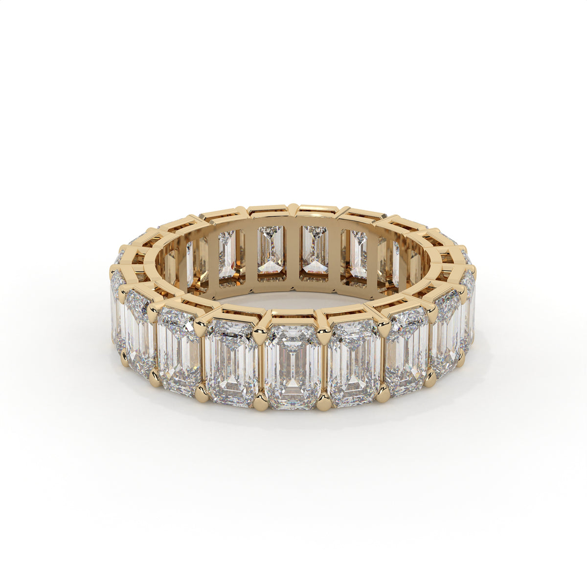 Emerald cut diamond eternity ring featuring a prong setting on a plain background.