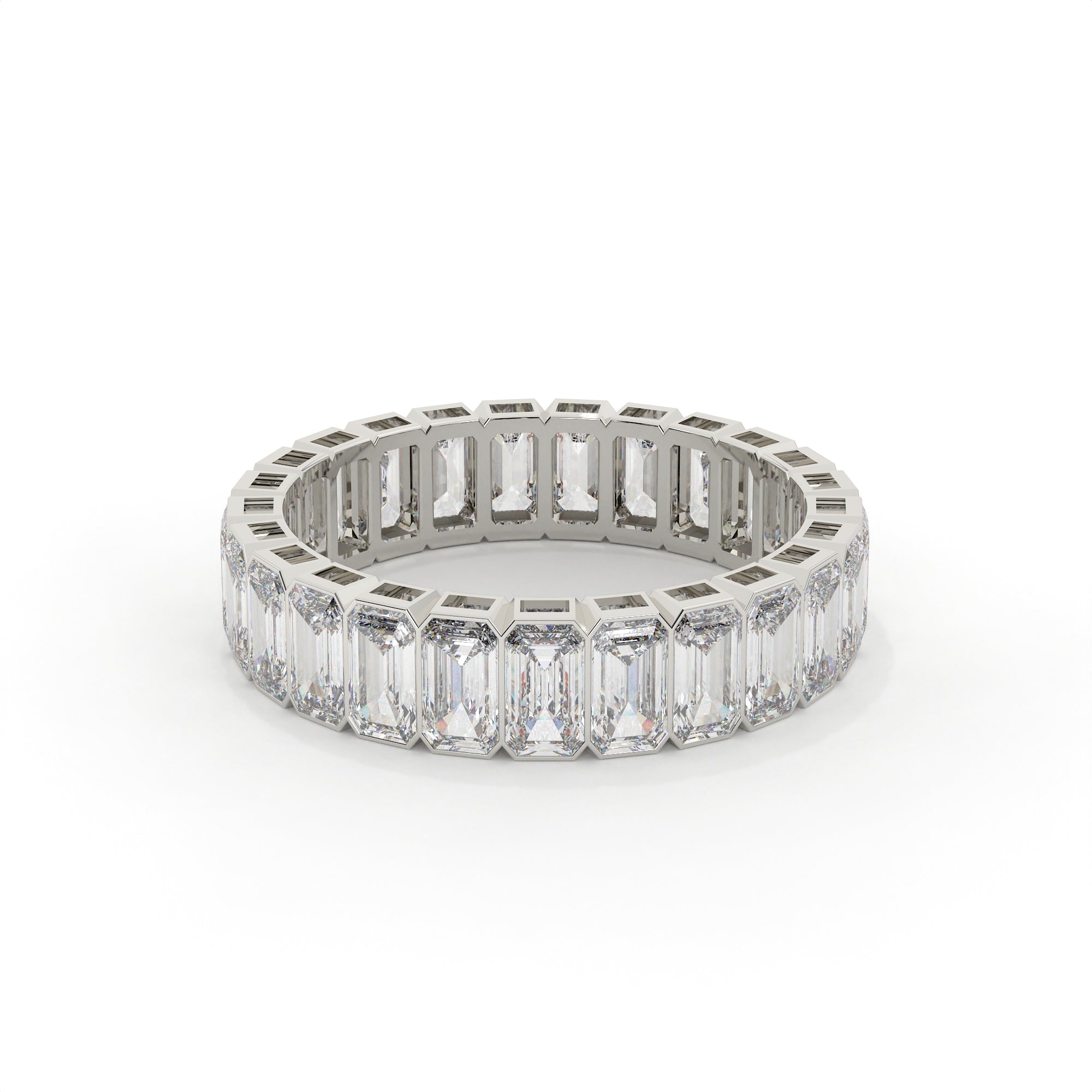 Diamond ring with emerald-cut stones on a white background