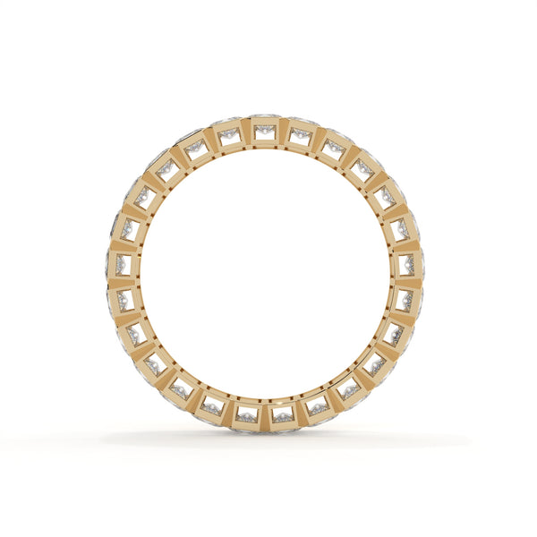 Gold ring with embedded diamonds on a white background
