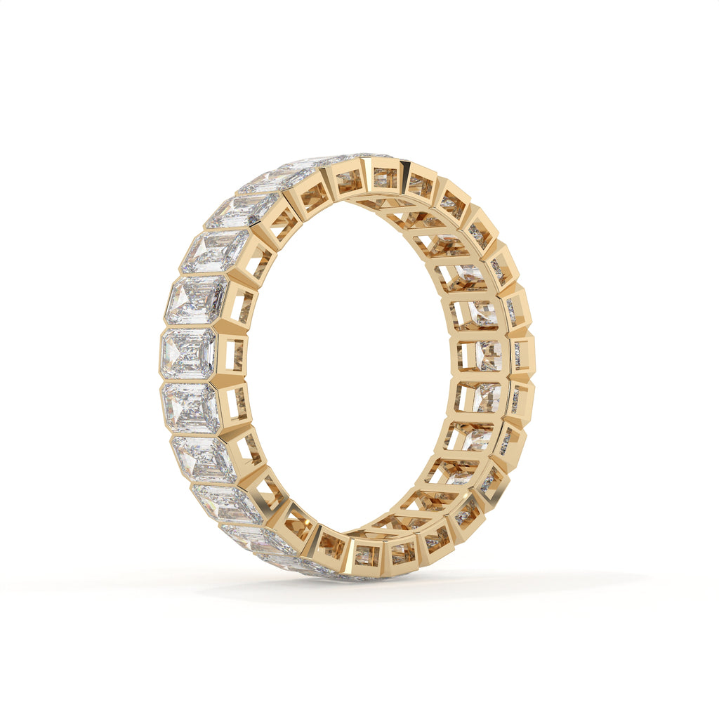 Gold and diamond ring on a white background