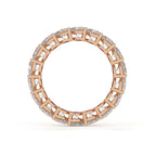 Rose gold ring with diamond accents on a white background