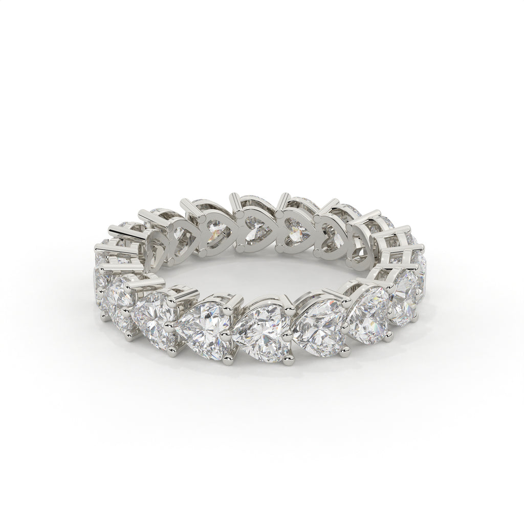 Silver ring with multiple diamonds on a white background