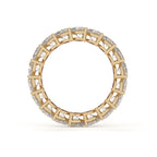 Gold ring with diamond accents on a white background