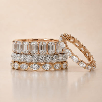 Set of diamond rings on a beige background