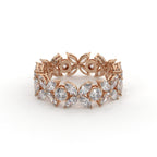 Rose gold bracelet with diamond accents on a white background
