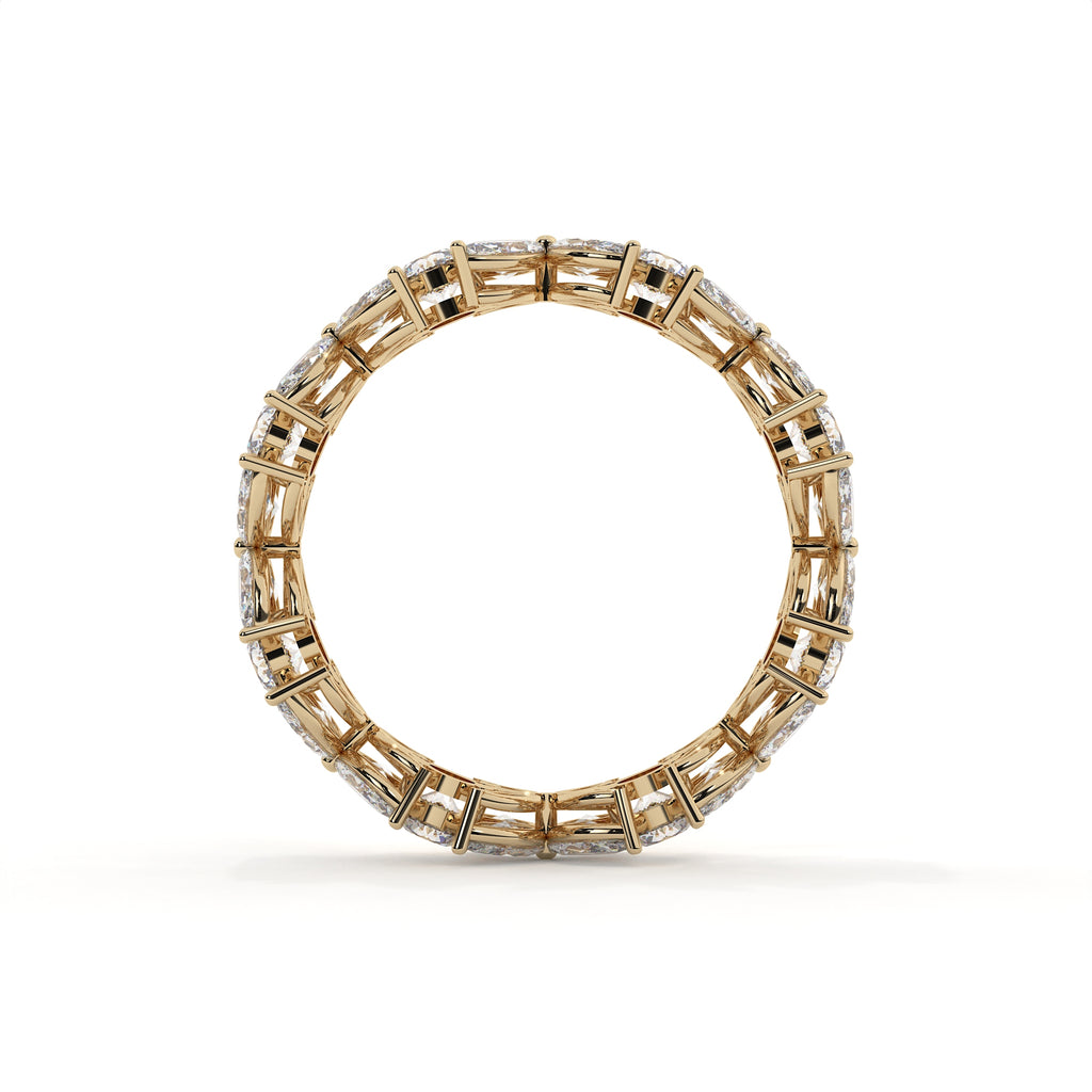 Gold ring with diamond accents on a white background