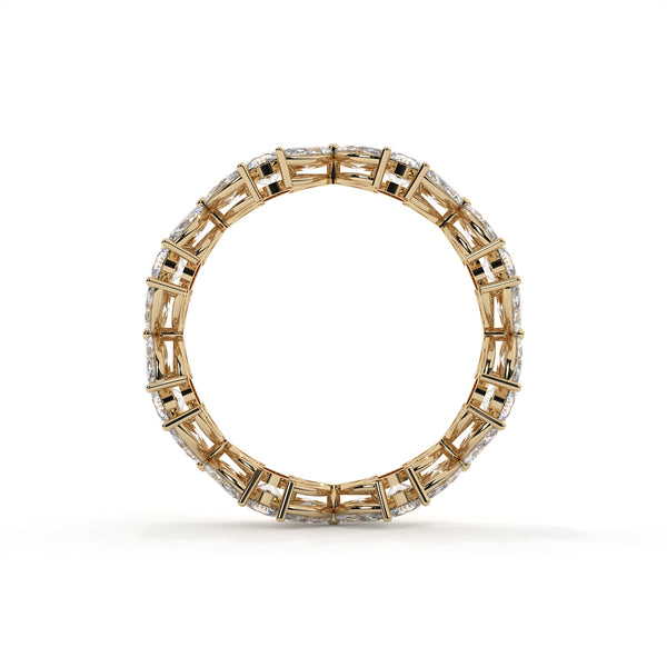 Gold ring with diamond accents on a white background