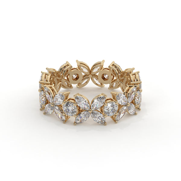 Gold bracelet with diamond accents on a white background