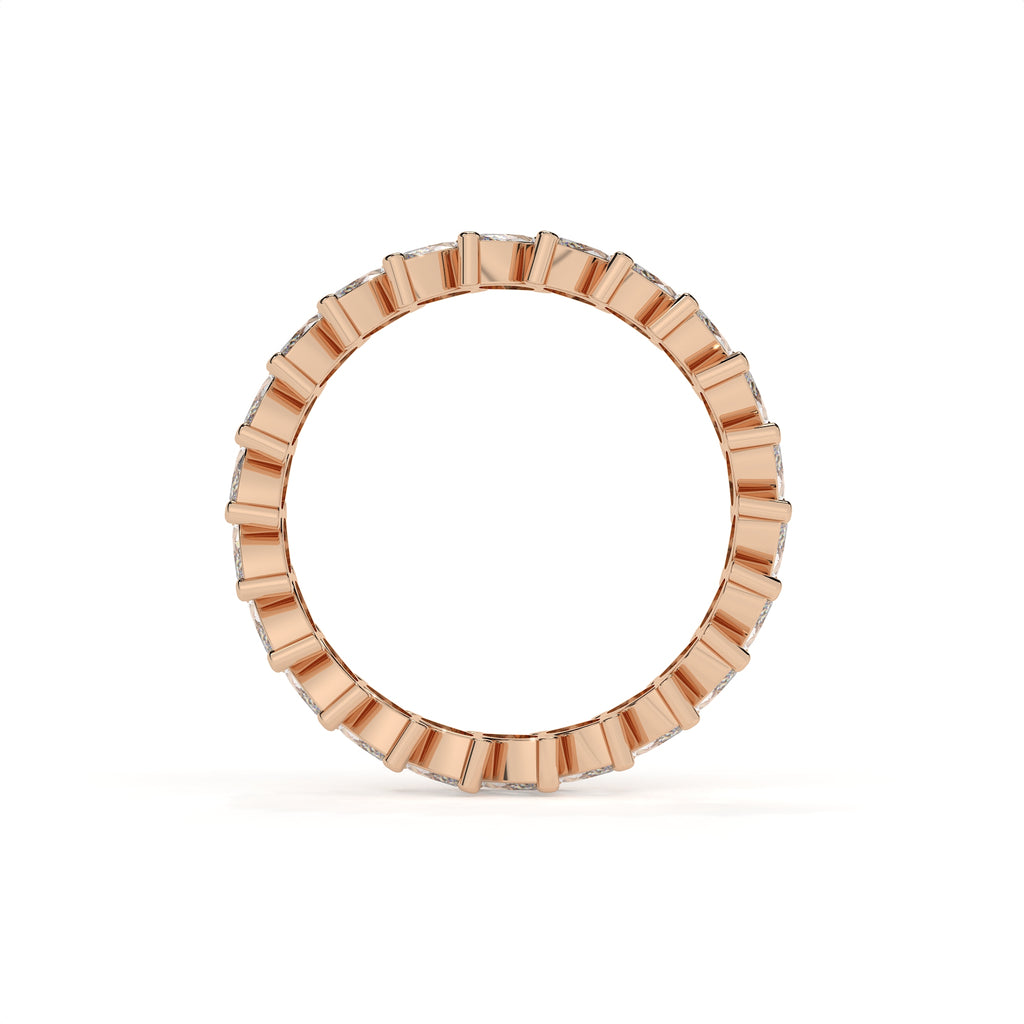 Rose gold ring with a unique design on a white background