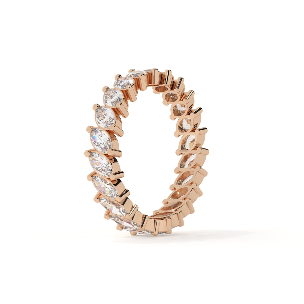 Rose gold ring with diamonds on a white background