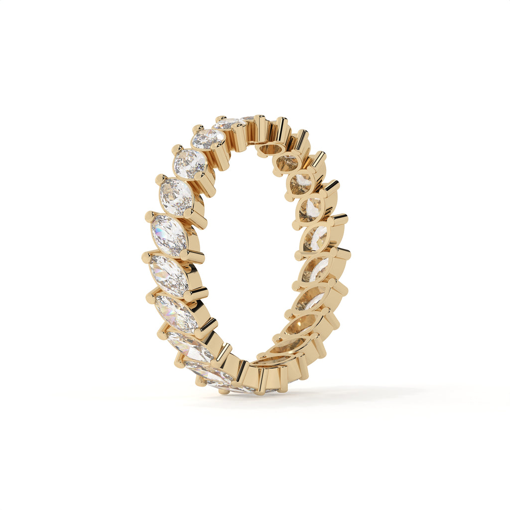 Gold ring with diamonds on a white background