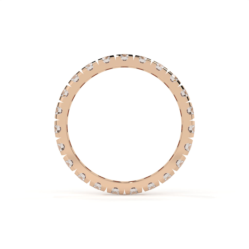 Rose gold ring with small diamonds on a white background