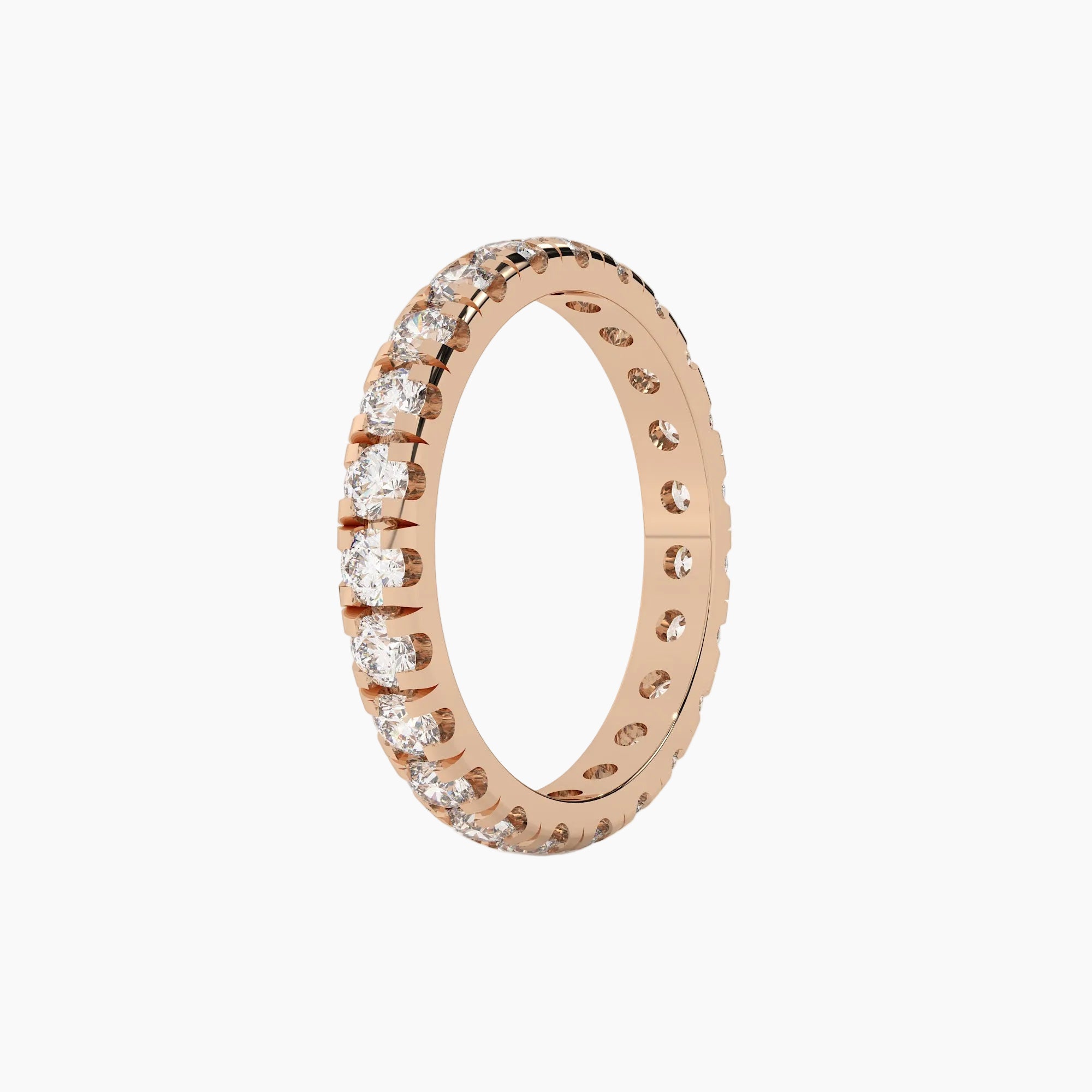 Rose gold ring with diamonds on a white background