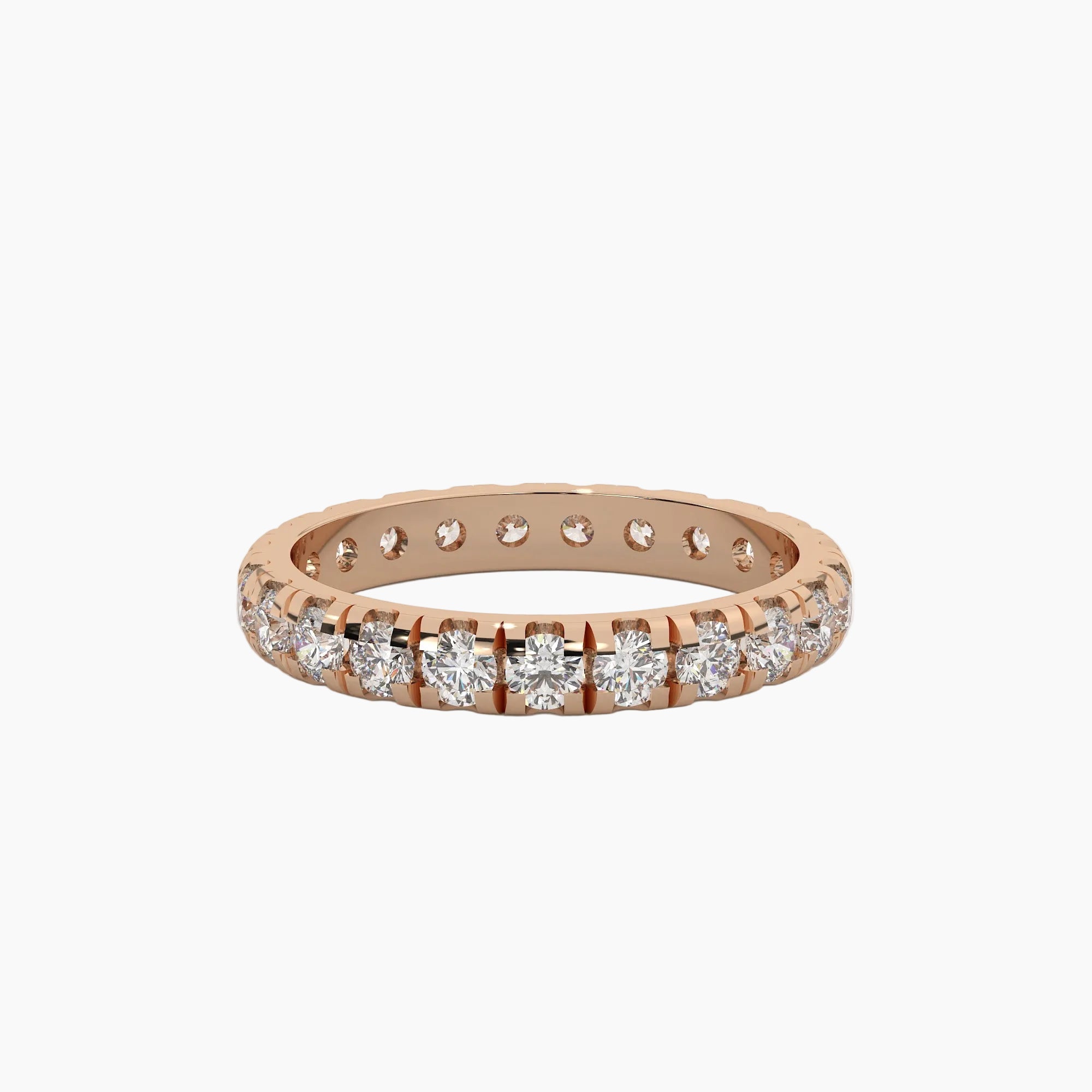 Rose gold ring with diamonds on a white background
