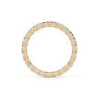 Gold ring with small diamonds on a white background