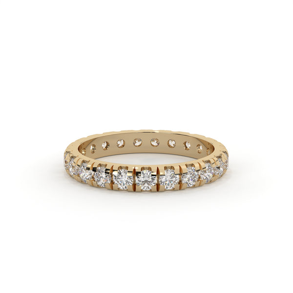 Gold ring with diamonds on a white background