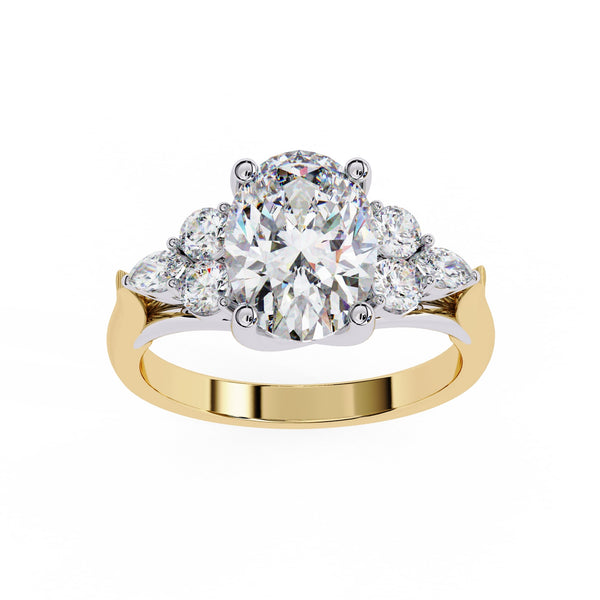 Gold ring with a large diamond and smaller diamonds on a white background