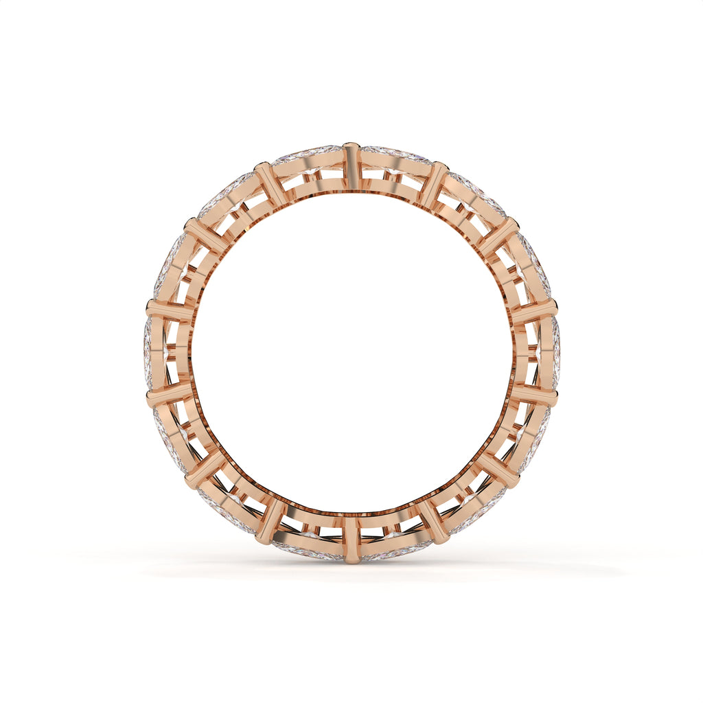 Rose gold ring with a lattice design on a white background