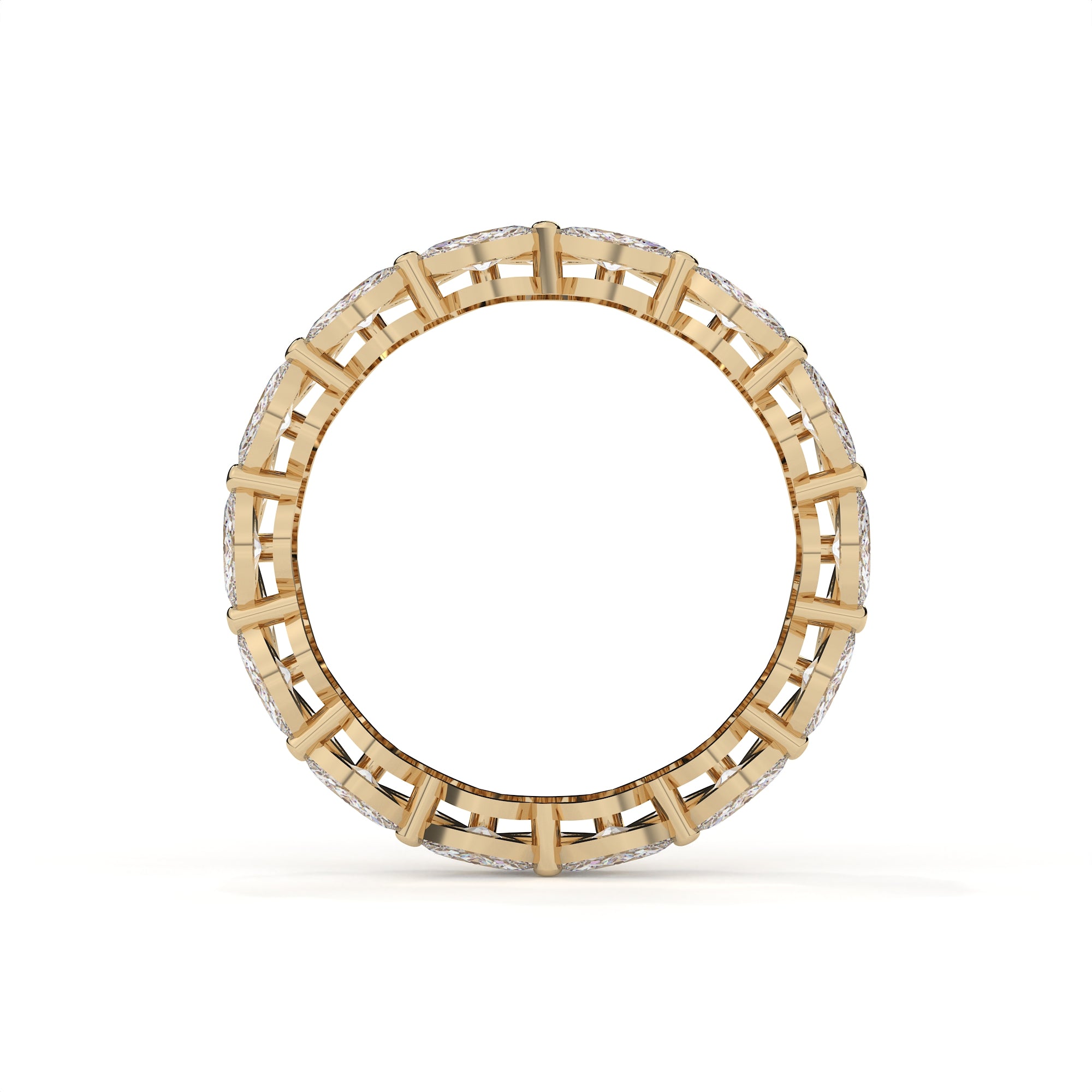Gold ring with a geometric design on a white background