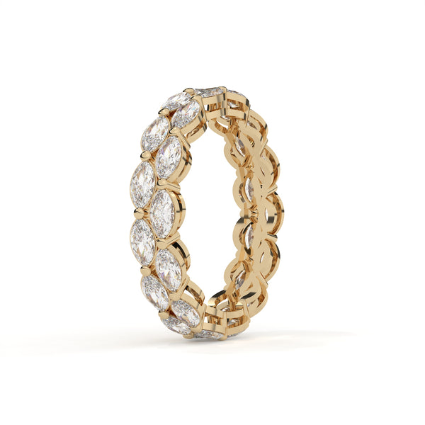 Gold and diamond ring on a white background