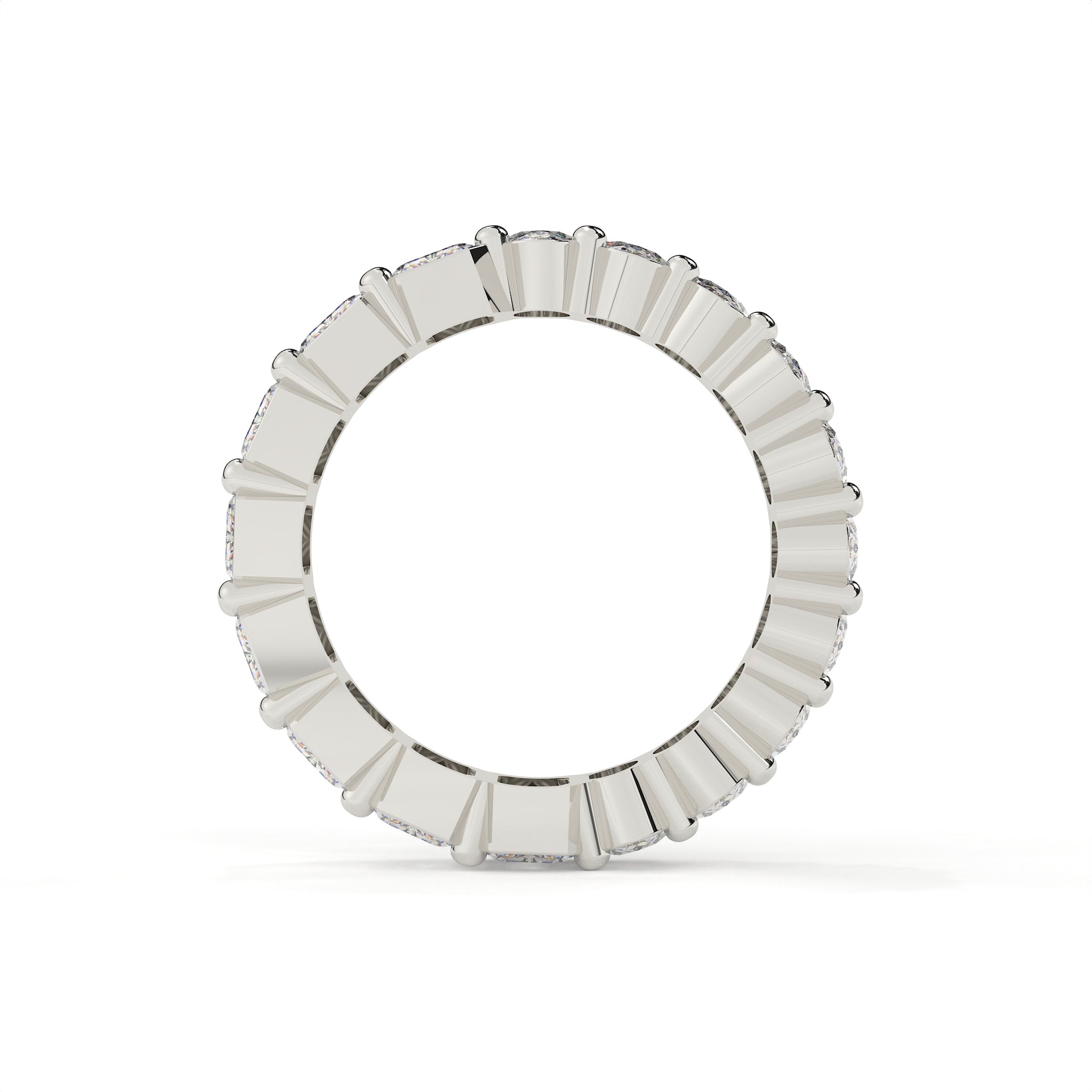 Silver ring with rectangular gemstones on a white background