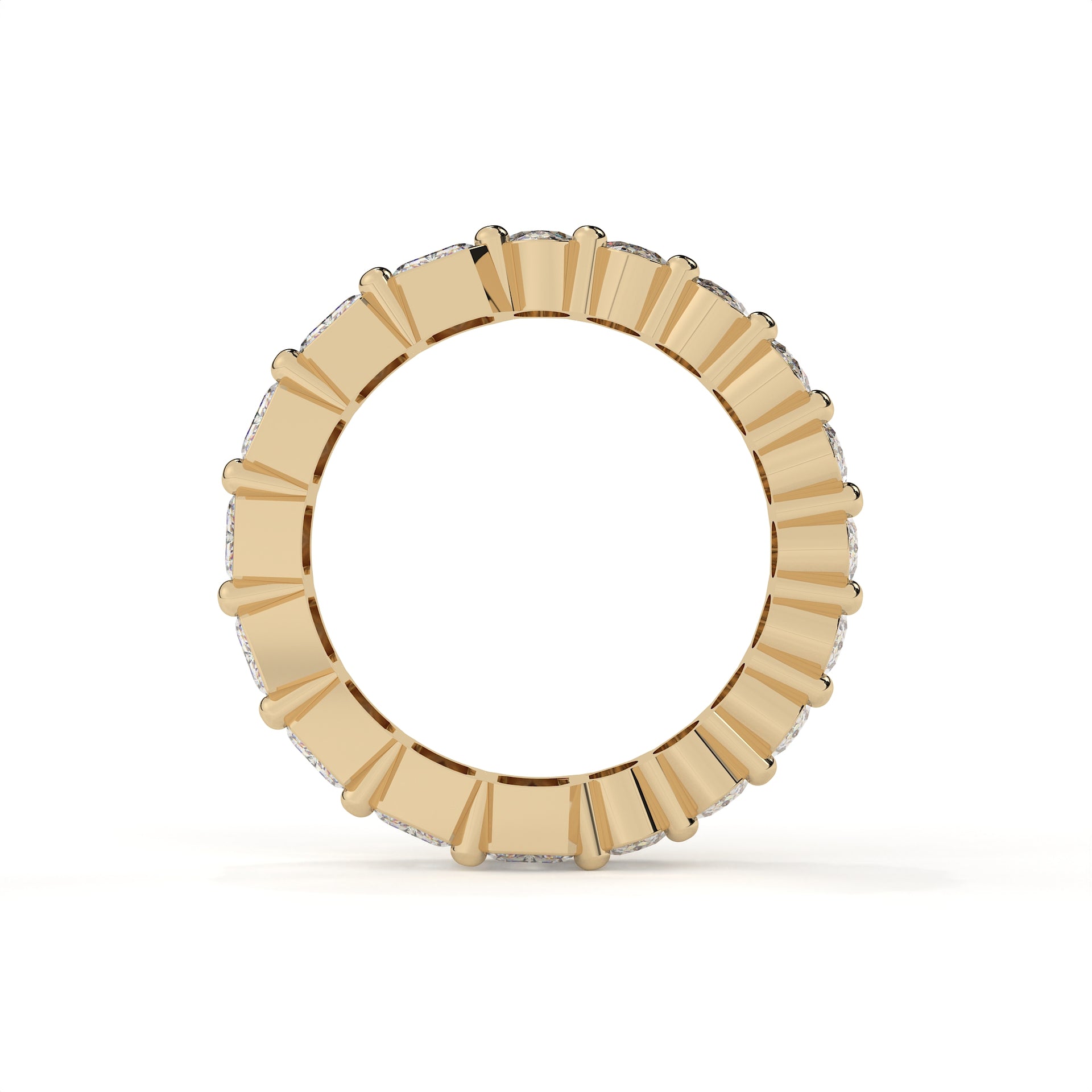 Gold ring with a central gemstone on a white background