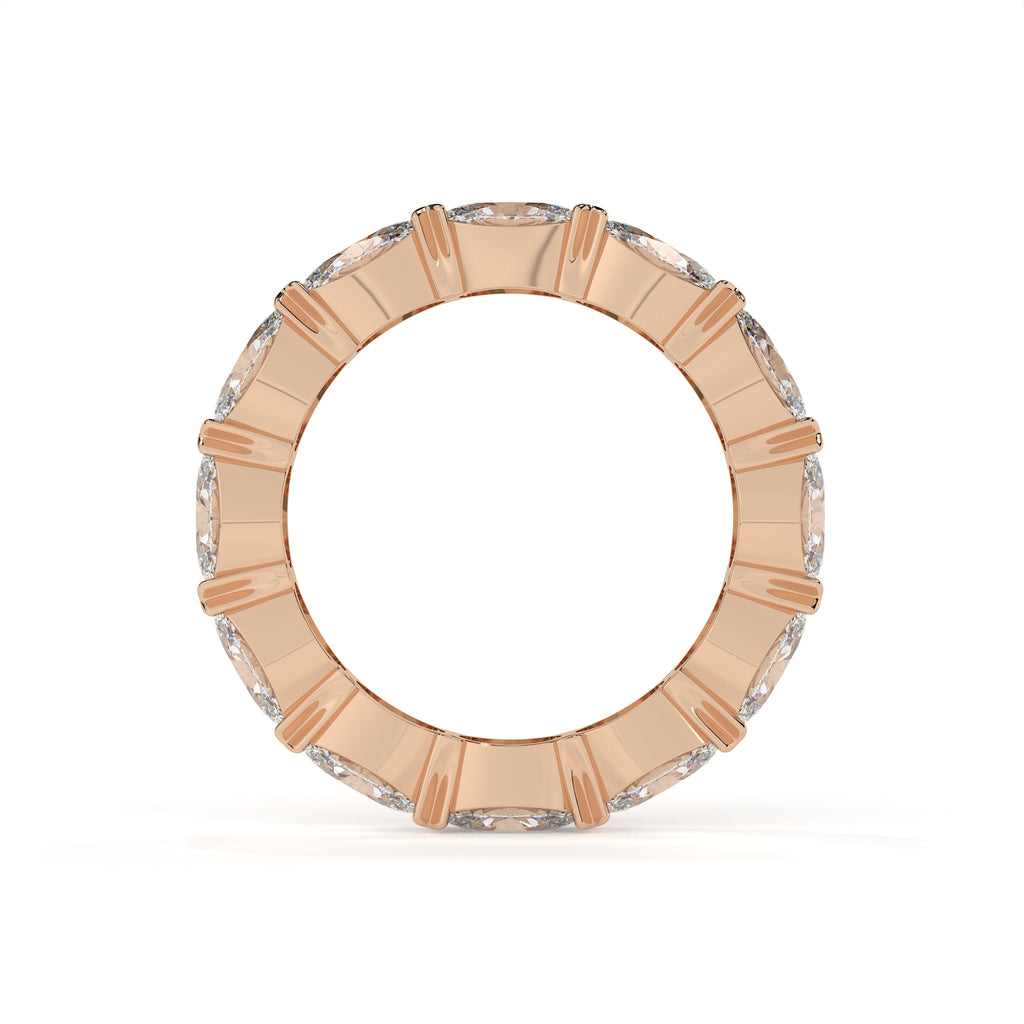 Rose gold ring with diamond accents on a white background