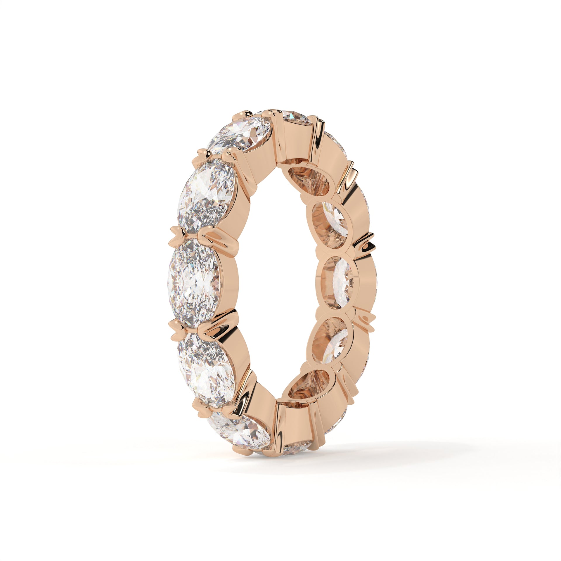 Rose gold ring with diamonds on a white background