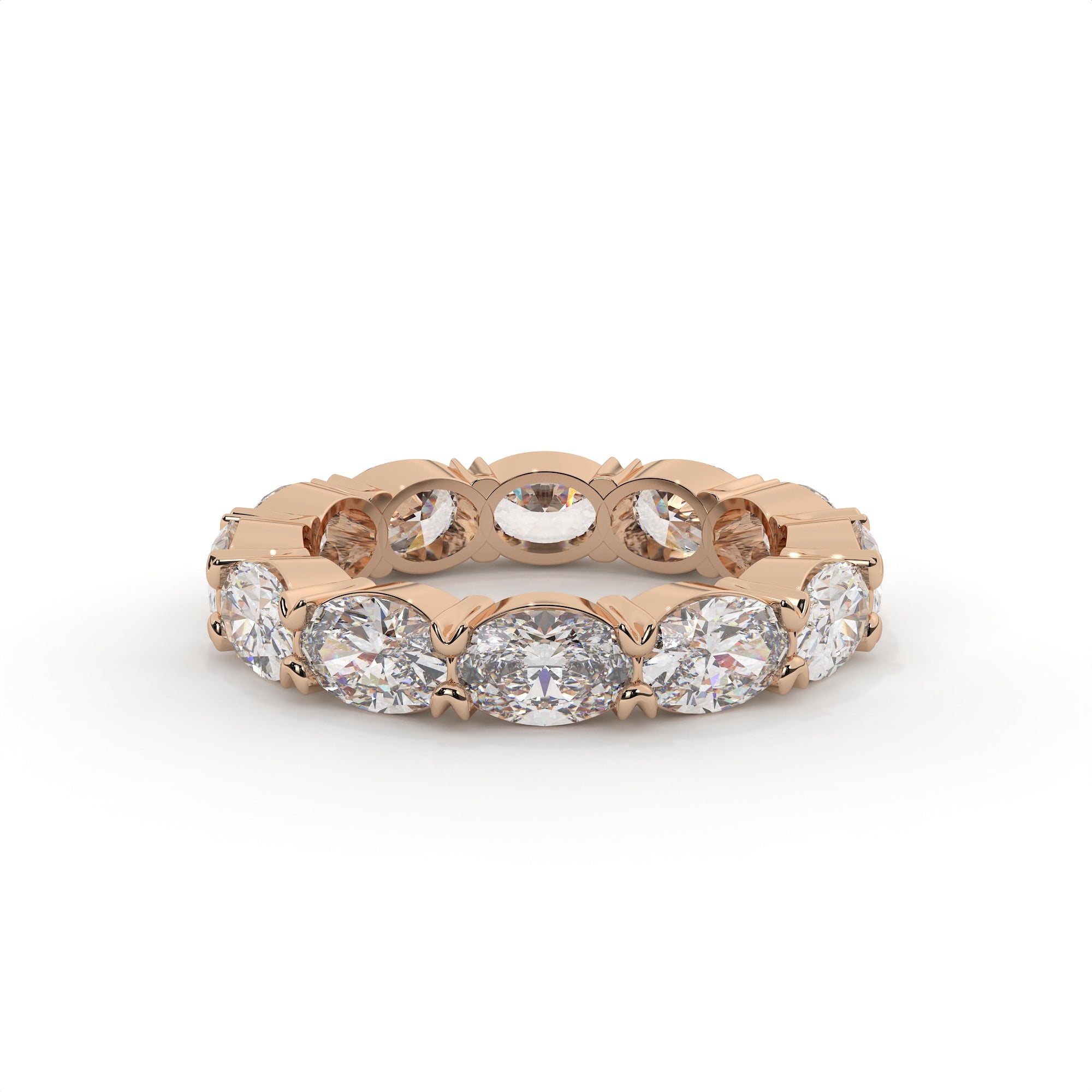 Rose gold ring with multiple diamonds on a white background