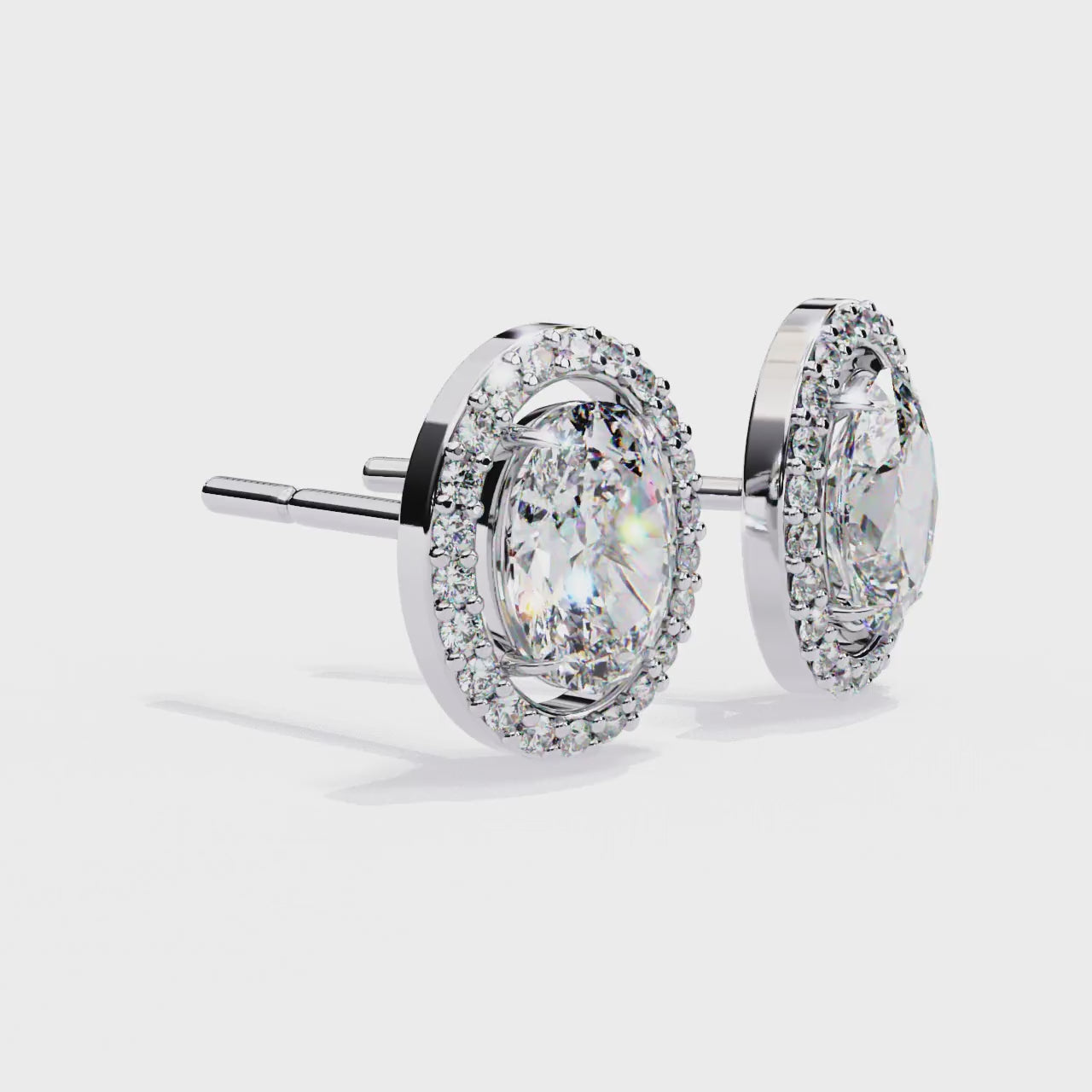 Oval halo stud earrings