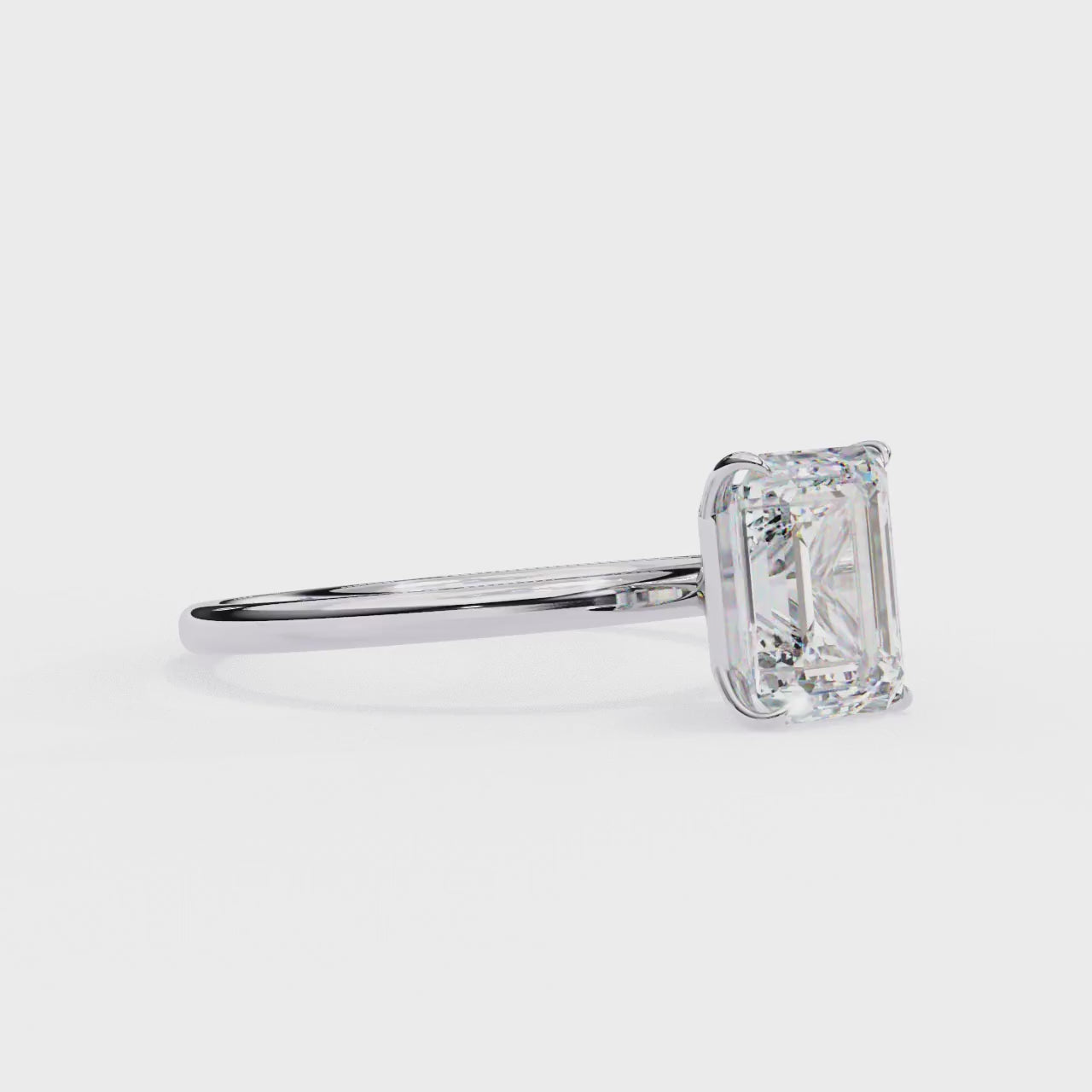 Solitaire Engagement Ring With Emerald Cut Diamond